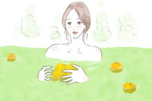 柚子風呂に入っている女性のイラスト
